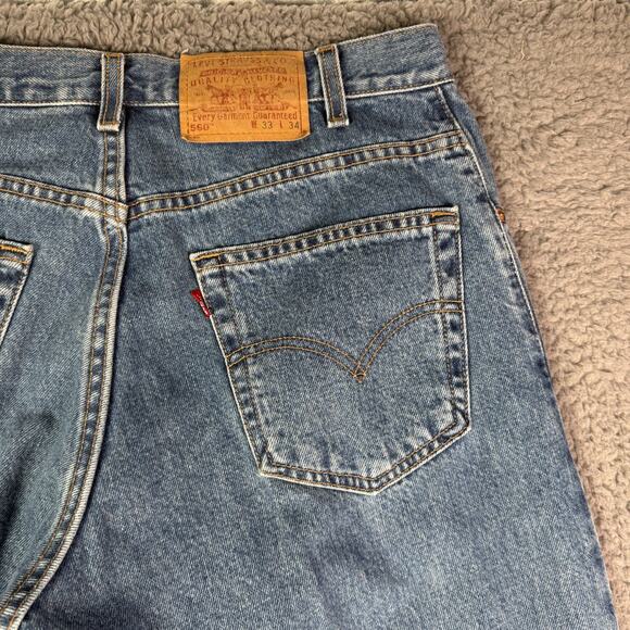 Levi's 560 Jeans Mens 33x34 Blue Denim Loose Fit Tapered Leg Baggy 90s USA Made - Picture 1 of 11